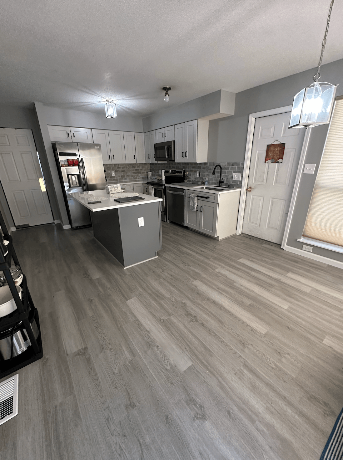 water-damage-repair-st-charles-mo-renovated-kitchen-and-flooring-after-professional-water-damage-repair
